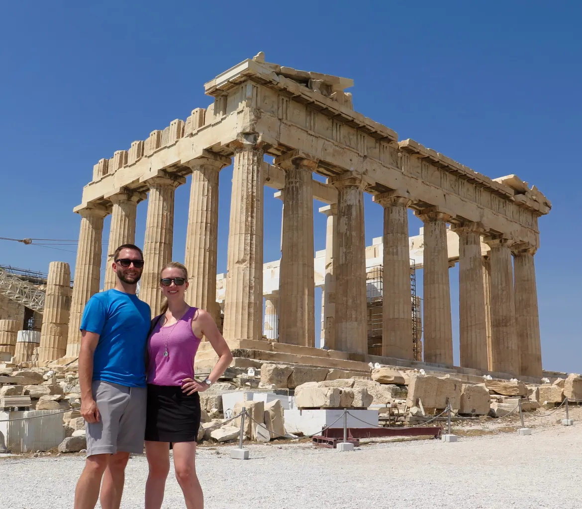 Couple in front of the Parthenon on the Acropolis — we arrange your Athens day tours at no commission