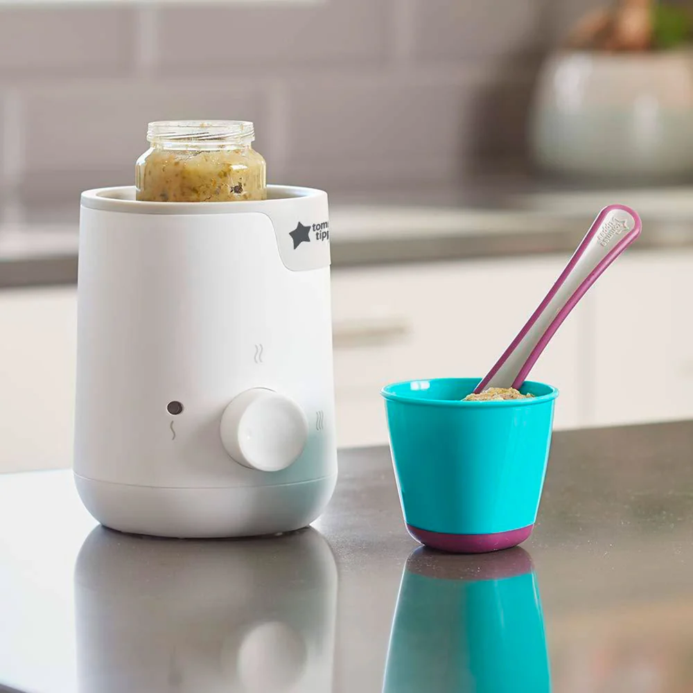 Baby bottle warmer and feeding cup for the nursing and baby changing room