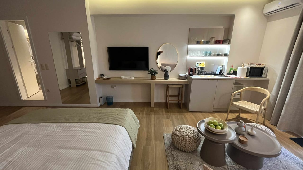 Family suite with kitchenette and a comfortable bed
